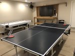 Game room with Ping Pong, Air Hockey, and Wall TV